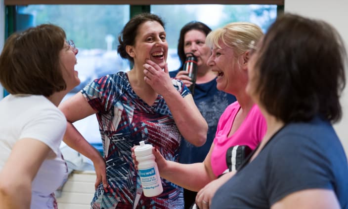 Image of women laughing at a Livewell exercise class